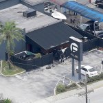 Law enforcement officials work at the Pulse nightclub in Orlando, Florida, on June 12 following a mass shooting. (AP Photo/Chris O&rsquo;Meara, File)