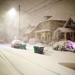 Heavy, wet snow fell and rapidly accumulated in SE Portland, Oregon, on Tuesday night, Jan. 10. (Dave Killen/The Oregonian via AP)