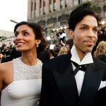 In this Feb. 27, 2005 photo, singer Prince arrives with his wife Manuela Testolini for the 77th Academy Awards in Los Angeles. (AP Photo/Kevork Djansezian, File)