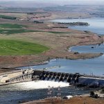 In this 2013 photo, the Ice Harbor Dam on the Snake River is seen near Pasco. Environmental groups are asking a federal court to halt 11 infrastructure projects on four lower Snake River dams in Washington state that could ultimately be removed following an environmental review now underway. (Bob Brawday/The Tri-City Herald via AP, File)
