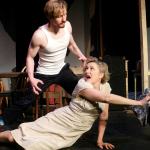 Unable to tolerate her intrusion any longer, Stanley (Brandon Borrmann) attacks Blanche (Erin Carter) during Red Curtain&rsquo;s production of &ldquo;A Streetcar Named Desire.&rdquo; (Red Curtain photo)