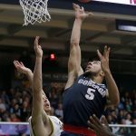 Gonzaga guard Nigel Williams-Goss (5) shoots over San Francisco forward Matthew McCarthy during the second half of a game Thursday in San Francisco. (AP Photo/Jeff Chiu)
