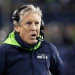 Seahawks head coach Pete Carroll watches from the sideline in the first half of a playoff game against the Lions this past Saturday in Seattle. (AP Photo/Elaine Thompson)