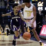Washington&rsquo;s David Crisp (left) guards California&rsquo;s Charlie Moore (13) in the second half of a game Thursday in Berkeley, Calif. (AP Photo/Ben Margot)