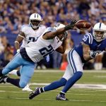 Titans cornerback Perrish Cox (20) leaps for a pass intended for Colts wide receiver Donte Moncrief (10) during a game Nov. 20 in Indianapolis. (AP Photo/Jeff Roberson)