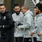 Sounders players, including forward Clint Dempsey (center) and team captain midfielder Osvaldo Alonso (second from right) jog during the first training session of the 2017 MLS season on Tuesday in Tukwila, Wash. (AP Photo/Ted S. Warren)