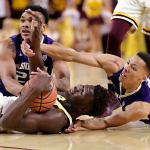 Arizona State forward Jethro Tshisumpa (left) and Washington&rsquo;s Carlos Johnson (rear) and Dominic Green compete for the ball and look for the call during the first half of a game Wednesday in Tempe, Ariz. (AP Photo/Matt York)