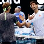 Serbia&rsquo;s Novak Djokovic (right) congratulates Uzbekistan&rsquo;s Denis Istomin after Istomin won their second-round match Thursday at the Australian Open tennis championships in Melbourne, Australia. (AP Photo/Aaron Favila)