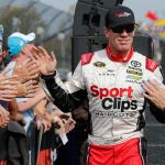 Sprint Cup Series driver Carl Edwards (19) greets fans in October during driver introductions for the NASCAR Sprint Cup auto race at Martinsville Speedway in Martinsville, Va. (AP Photo/Steve Helber, File)