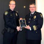 The Employee of the Year was Arlington Police officer Lucas Adkins (left) is named Employee of the Year by Police Chief Jonathan Ventura at a Dec. 18 awards ceremony. Adkins also was awarded the Chief&rsquo;s DUI Enforcement Award that night. (Contributed photo)