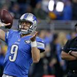 Detroit Lions coach Jim Caldwell (right) watches quarterback Matthew Stafford warm up for the team&rsquo;s game against the Green Bay Packers on Sunday. (AP Photo/Duane Burleson)