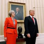 President Donald Trump stands with British Prime Minister Theresa May on Friday, Jan. 27, in the Oval Office of the White House in Washington. (AP Photo/Pablo Martinez Monsivais)