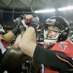 Atlanta Falcons quarterback Matt Ryan huddles with his teammates before an NFL game against the New Orleans Saints on Jan. 1 in Atlanta. (AP Photo/David Goldman, File)