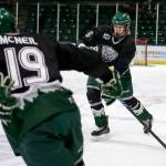 U16 Everett Junior Silvertips wingers Caden Pattison (right) and Jake McNeil work through drills during practice Jan. 11 at Xfinity Arena in Everett. (Kevin Clark / The Herald)