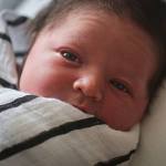 Maxwell Daniel Hansen, 8 pounds and 6 ounces, was born at 1:07 a.m. at Providence Women&rsquo;s and Children Center in Everett on Sunday. (Kevin Clark / The Herald)