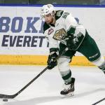 The Silvertips&rsquo; Aaron Irving looks to pass during a game against Spokane this past Sunday afternoon at Xfinity Arena. (Kevin Clark / The Herald)