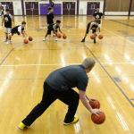 Former Lake Stevens basketball player Dylin Stoen leads a conditioning drill known as &ldquo;Dylin Time&rdquo; on Friday at Lake Stevens High School. (Kevin Clark / The Herald)