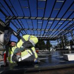 Tom Ertl works on the frame of the Arlington Boys and Girls Club&rsquo;s new gym Wednesday. The new gym will be about the same width as the old one but will be longer, allowing for another set of basketball hoops. (Ian Terry / The Herald)