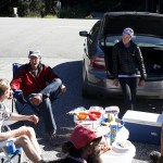 Rich Steward (center left), of Mukilteo, chats with Pacific Crest Trail thru hikers near to where the famous trail crosses Highway 20 in the North Cascades National Park on Thursday, Sept 15. (Ian Terry / The Herald)