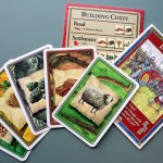 Players trade and spend resources to build their settlements on the island of Catan. (Andy Bronson / The Herald)