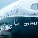 In this 2015 photo, the first Boeing 737 MAX airplane to roll off Boeing&rsquo;s assembly line in Renton is shown parked before an employee-only rollout event. The Dow Jones industrial average climbed to the 20,000-point mark from 19,000 largely because of three stocks: financial firm Goldman Sachs, aerospace giant Boeing, and technology and consulting company IBM. (AP Photo/Ted S. Warren, File)