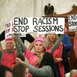 Protestors from CodePink, including co-founder Medea Benjamin, take part in a demonstration on Capitol Hill in Washington on Tuesday, Jan. 10, during Senate Judiciary Committee&rsquo;s confirmation hearing for Attorney General-designate, Sen. Jeff Sessions, R-Ala. (AP Photo/Andrew Harnik)