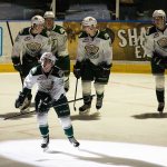 The Everett Silvertips&rsquo; Kevin Davis looks up at the replay of his goal on the score board as he skates away from teammates as the Silvertips beat Kelowna 5-4 at Xfinity Arena on Monday, Jan. 16, 2017 in Everett, Wa. (Andy Bronson / The Herald)