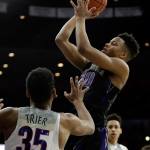 Washington guard Markelle Fultz (20) shoots over Arizona guard Allonzo Trier during the first half of the Pac-12 game Sunday, Jan. 29, in Tucson, Ariz. (AP Photo/Rick Scuteri)