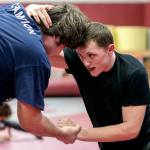 Cascade wrestlers Adam Holston (right) and Andrew Raymond work out during practice on Jan. 18 in Everett. (Kevin Clark / The Herald)