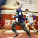 Stanwood&rsquo;s Mason Phillips (center) runs through drills during practice Jan. 5 at Stanwood High School. (Kevin Clark / The Herald)