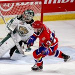 Spokane&rsquo;s Riley Woods makes the game winning goal past Silvertips Carter Hart Sunday afternoon at Xfinity Arena on January 22, 2017. Spokane won 4-3 in the shootout. (Kevin Clark / The Herald)