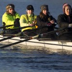 Club members head out onto the frigid waters of Lake Stevens in the early morning. (Ian Terry / The Herald)