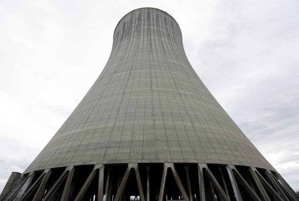 This Nov. 29, 2016 photo shows the cooling tower at Nine Mile Point nuclear power plant in Oswego, N.Y. It is part of the state&rsquo;s plans for increased renewable energy sources, but is drawing criticism. (AP Photo/Mike Groll)