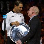 Spain&rsquo;s Rafael Nadal, left, receives runner-up trophy from Rod Laver after losing to Switzerland&rsquo;s Roger Federer during the men&rsquo;s singles final at the Australian Open tennis championships in Melbourne, Australia, Sunday, Jan. 29, 2017. (AP Photo/Aaron Favila)