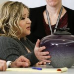 Mukilteo shooting victim Jacob Long&rsquo;s mother Autumn Snider addresses the court with an urn containing her son&rsquo;s ashes during a sentencing hearing for shooter Allen Ivanov in Everett on Thursday, Jan. 12. (Ian Terry / The Herald)