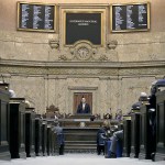 Gov. Jay Inslee gives his inaugural address to a joint session of the Legislature on Wednesday as he begins his second term, Jan. 11, in Olympia. (AP Photo/Elaine Thompson)