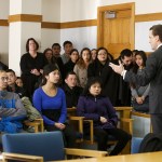Snohomish County Deputy prosecutor Adam Cornell (right) addresses a packed courtroom in Everett before the sentencing hearing for Mukilteo shooter Allen Ivanov on Thursday, Jan. 12. (Ian Terry / The Herald)