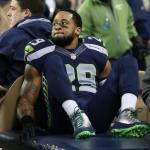 Seattle Seahawks safety Earl Thomas is carted off the field Dec. 4 after beaking his leg in a game against the Carolina Panthers.(Kevin Clark / The Herald)