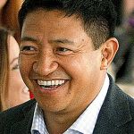 Developer Lobsang Dargey (center) attends a sneak peak event at Potala Place Everett on April 30, 2015.                                (Ian Terry / The Herald)