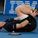 Murray advances at Australian Open despite tweaking an ankle