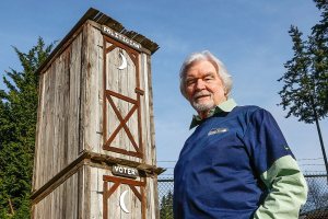 What&rsquo;s Up about the two-story Politician/Voter outhouse behind Rustic Cuts barbershop in Silver Lake? Barber Don Baird, 76, built the outhouse from barnwood he had leftover when he built his barbershop 6 years ago as a statement about how voters get dumped on. (Dan Bates / The Herald)