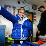 Everett firefighters bring warmth to kids with new coats