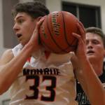 Newhouse scores 29 to lead Monroe boys over Jackson 70-58