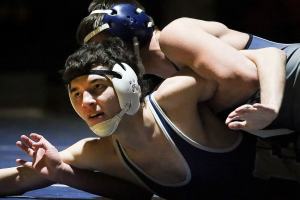 Arlington continues wrestling dominance with win over Everett