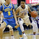 Washington&rsquo;s Markelle Fultz (20) is defended by UCLA&rsquo;s Lonzo Ball in a matchup of star freshman guards during the Bruins&rsquo; 107-66 thrashing of the Huskies in front of a sold-out crowd at Hec Edmondson Pavilion on Saturday in Seattle. (AP Photo/Elaine Thompson)