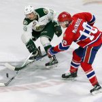 Everett&rsquo;s Connor Dewar (left) battles with Spokane&rsquo;s Ethan McIndoe during a game at Everett&rsquo;s Xfinity Arena on Jan. 31, 2016. Dewar, nicknamed &ldquo;the Pitbull&rdquo; by the Silvertips&rsquo; broadcaster, brings heart, passion and fire that he learned growing up in Manitoba to the Silvertips. (Kevin Clark/The Herald)