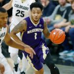 Washington&rsquo;s David Crisp (right) drives past Colorado&rsquo;s George King after a steal in the first half of the Huskies&rsquo; 81-66 loss to the Buffaloes on Thursday in Boulder, Colo. (AP Photo/David Zalubowski)