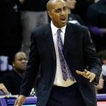 Washington men&rsquo;s basketball coach Lorenzo Romar directs his team during a Feb. 1 game in Seattle. (AP Photo/Elaine Thompson)