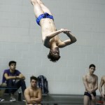Glacier Peak&rsquo;s Connor May extends in the air during the diving competition at the 4A State Boys Swimming and Diving Championship at the King County Aquatic Center in Federal Way on Feb. 18, 2017. May placed third in the competition. (Ian Terry / The Herald)