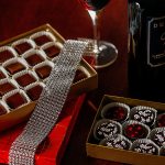 These chocolates were handmade by Windsor Vest for Domestic Violence Services of Snohomish County&rsquo;s annual Chocolate Lovers Gala. At left are dark chocolate meltaways made with coconut oil. Vest likes to pair them with wine such as the Dussek cabernet sauvignon shown above. In the right foreground are Vest&rsquo;s peanut clusters made with dark chocolate. The 25th annual gala is March 10 at the Tulalip Resort Casino. (Dan Bates / The Herald)